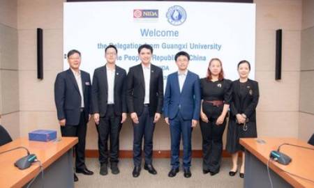 Dr. Li Renliang, a faculty member, participated in welcoming the delegation from Guangxi University